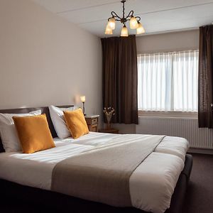 Kamer met een Queen Size Bed